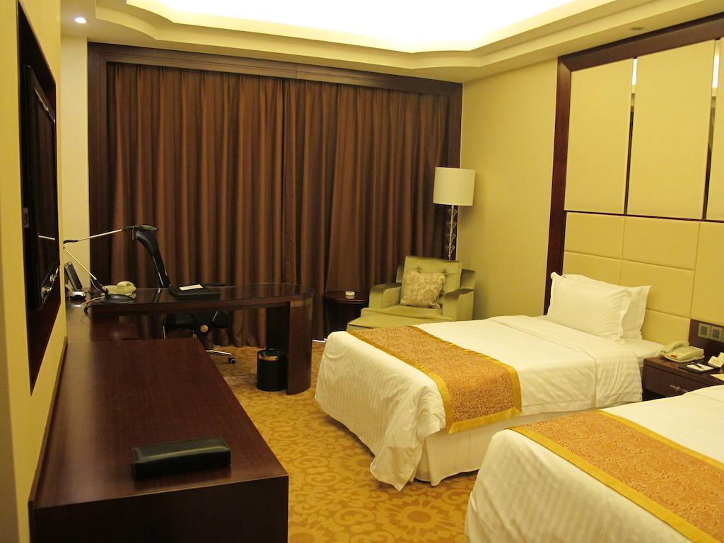 Regal Kangbo Hotel Dezhou Room photo